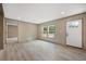 Bright living room with an open floor plan and modern flooring at 106 Swanson Dr, Summerville, SC 29483