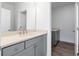 Bathroom featuring a gray vanity with stone countertop and modern faucet at 1076 Williams Rd, Charleston, SC 29412