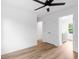 A bright bedroom with an en suite bathroom features wood-look floors and a ceiling fan at 1076 Williams Rd, Charleston, SC 29412