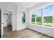 Bright bedroom with multiple windows offering views of the surrounding neighborhood at 1076 Williams Rd, Charleston, SC 29412