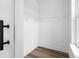 Walk-in closet with ample shelving and hardwood floors at 1076 Williams Rd, Charleston, SC 29412