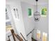Bright two-story foyer featuring a modern light fixture and ample natural light at 1076 Williams Rd, Charleston, SC 29412