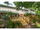 Multi-level back deck offers multiple spots for outdoor enjoyment and views of lush lawn at 1166 Julian Clark Rd, Charleston, SC 29412
