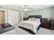 Bedroom with a comfortable bed, ceiling fan, and dressers providing ample storage at 1166 Julian Clark Rd, Charleston, SC 29412