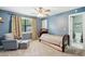 Bedroom with a cozy chair, bright window and a comfortable single bed at 1166 Julian Clark Rd, Charleston, SC 29412