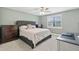 Bedroom with soft carpet, a large window, ceiling fan, and neutral paint at 1166 Julian Clark Rd, Charleston, SC 29412