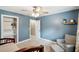 Bedroom showcasing a chair, a window, and a view into the bathroom at 1166 Julian Clark Rd, Charleston, SC 29412