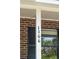 Close-up of the clearly visible house number, 1166, displayed on a white column at 1166 Julian Clark Rd, Charleston, SC 29412