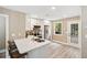 Well-equipped kitchen with stainless steel appliances, white cabinets, countertops, and an island with seating at 1166 Julian Clark Rd, Charleston, SC 29412
