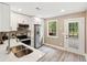 Updated kitchen with stainless steel appliances, white cabinets, countertops, and a backyard view at 1166 Julian Clark Rd, Charleston, SC 29412
