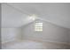 Finished attic space with neutral carpet and window at 127 Cornell Dr, Ladson, SC 29456