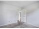 This carpeted bedroom features fresh paint and an open doorway to other areas of the home at 127 Cornell Dr, Ladson, SC 29456