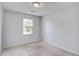 A bright bedroom with neutral walls and carpet offers a serene and comfortable atmosphere at 127 Cornell Dr, Ladson, SC 29456