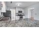 Charming kitchen featuring granite countertops, white cabinets, and stainless steel appliances at 127 Cornell Dr, Ladson, SC 29456