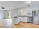 Bright kitchen featuring white cabinets, stainless steel appliances, and an open floor plan at 127 Cornell Dr, Ladson, SC 29456
