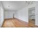 Spacious living room featuring beautiful hardwood floors, neutral walls and open floor plan to the kitchen at 127 Cornell Dr, Ladson, SC 29456