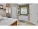 Bathroom with tile floors, a tub, two windows, and one door at 172 Cotillion Cresent Cres, Summerville, SC 29483
