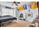 Bedroom featuring carpet floors, a ceiling fan, and unique sports memorabilia at 172 Cotillion Cresent Cres, Summerville, SC 29483