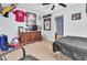 Bedroom with carpet floors, ceiling fan, dresser, and baseball memorabilia at 172 Cotillion Cresent Cres, Summerville, SC 29483