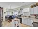 Bright kitchen with light-colored cabinets, an island, and an adjacent dining area at 172 Cotillion Cresent Cres, Summerville, SC 29483