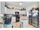 Well-organized kitchen featuring white cabinets, granite countertops, and tile flooring at 172 Cotillion Cresent Cres, Summerville, SC 29483