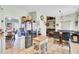Open kitchen with dining nook, tile flooring, light cabinets and stainless steel refrigerator at 172 Cotillion Cresent Cres, Summerville, SC 29483