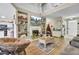 Comfortable living room featuring a fireplace, built-ins, hardwood floors, and stylish decor at 172 Cotillion Cresent Cres, Summerville, SC 29483