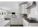 Bright kitchen with stainless steel appliances and breakfast bar at 1825 Crossbill Trl, Hanahan, SC 29410