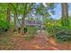 Lush backyard with a pergola, perfect for relaxing and entertaining at 202 Hunt Club Dr, Summerville, SC 29485