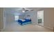 A cozy bedroom features a ceiling fan and an ensuite bathroom view, offering comfort and convenience at 202 Hunt Club Dr, Summerville, SC 29485