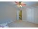Comfortable bedroom with closet, offering a cozy space with a bed and easy access to hallway at 202 Hunt Club Dr, Summerville, SC 29485
