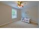 Bright bedroom with natural light, offering a cozy space with a daybed and window at 202 Hunt Club Dr, Summerville, SC 29485