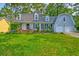 Lovely two-story home with a well-maintained lawn and two car garage at 202 Hunt Club Dr, Summerville, SC 29485