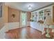 Bright office with built-in bookshelves, wainscoting and wood floors at 202 Hunt Club Dr, Summerville, SC 29485