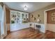 Stylish office featuring a built-in bookcase, hardwood floors, and elegant decor at 202 Hunt Club Dr, Summerville, SC 29485