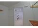 A spacious walk-in closet provides ample storage with shelving and rods for organized wardrobe solutions at 202 Hunt Club Dr, Summerville, SC 29485