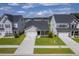Aerial view of a neighborhood with well-manicured lawns and modern homes at 206 Camellia Bloom Dr, Moncks Corner, SC 29461