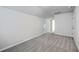Bright, spacious bedroom with neutral carpet and ample natural light from the transom window at 206 Camellia Bloom Dr, Moncks Corner, SC 29461