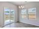 Dining area featuring sliding glass doors and a view of the backyard at 206 Camellia Bloom Dr, Moncks Corner, SC 29461