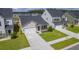 Charming home featuring a well-manicured lawn, a two-car garage, and a welcoming exterior at 206 Camellia Bloom Dr, Moncks Corner, SC 29461