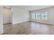 Spacious room with wood floors and bright windows at 206 Camellia Bloom Dr, Moncks Corner, SC 29461