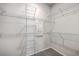 Walk-in closet features metal shelving and carpet at 206 Camellia Bloom Dr, Moncks Corner, SC 29461