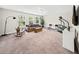 View of the carpeted basement featuring a living area and workout equipment at 2152 Pentland Dr, Charleston, SC 29412
