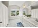 Bright bathroom with double vanity, modern fixtures, and a large window with natural light at 2152 Pentland Dr, Charleston, SC 29412