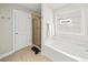 This bathroom features a soaking tub, a separate shower, and a window at 2152 Pentland Dr, Charleston, SC 29412