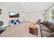 Comfortable bonus room featuring neutral paint, modern lighting, comfortable seating, and television at 2152 Pentland Dr, Charleston, SC 29412