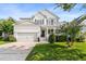 Charming two-story home with a well-manicured lawn, a two car garage and inviting front porch at 2152 Pentland Dr, Charleston, SC 29412