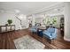 Spacious living room with hardwood floors, a fireplace, and an open-concept design at 2152 Pentland Dr, Charleston, SC 29412