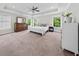 Spacious main bedroom with large windows, tray ceiling, and lots of natural light at 2152 Pentland Dr, Charleston, SC 29412