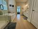 Bright bathroom featuring a soaking tub, separate shower, and neutral tile at 2221 Generals St, Charleston, SC 29492